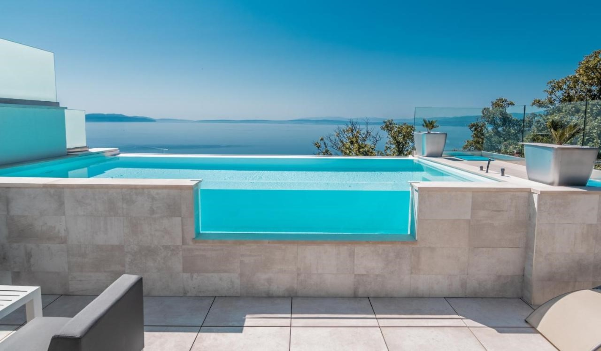 Modern semi-detached house with infinity pool and panoramic sea view ...