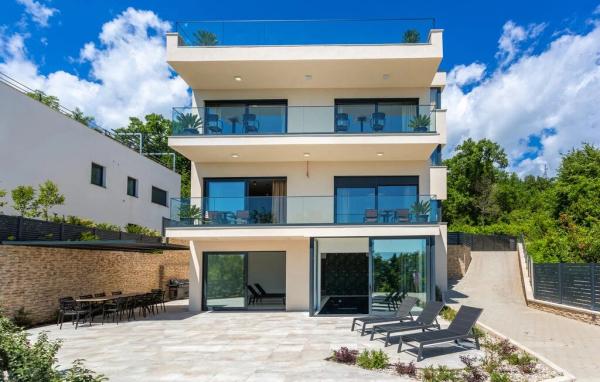 Newly built modern villa with panoramic sea view and indoor pool surrounded by nature
