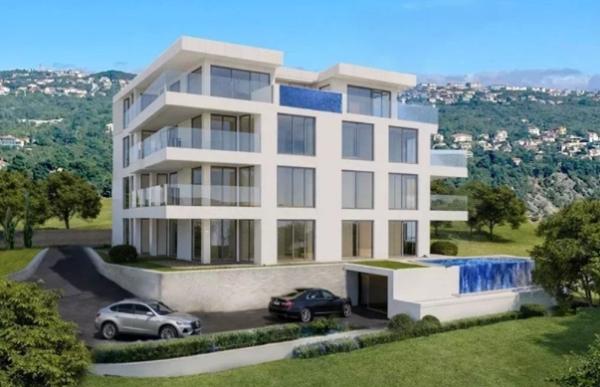 Baugrundstück in Opatija mit Genehmigung für 10 Wohnungen und Panoramablick auf das Meer