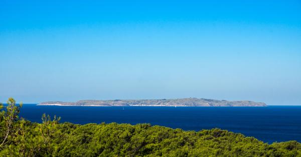 Luxury waterfront estate with marina, helipad, and panoramic sea views