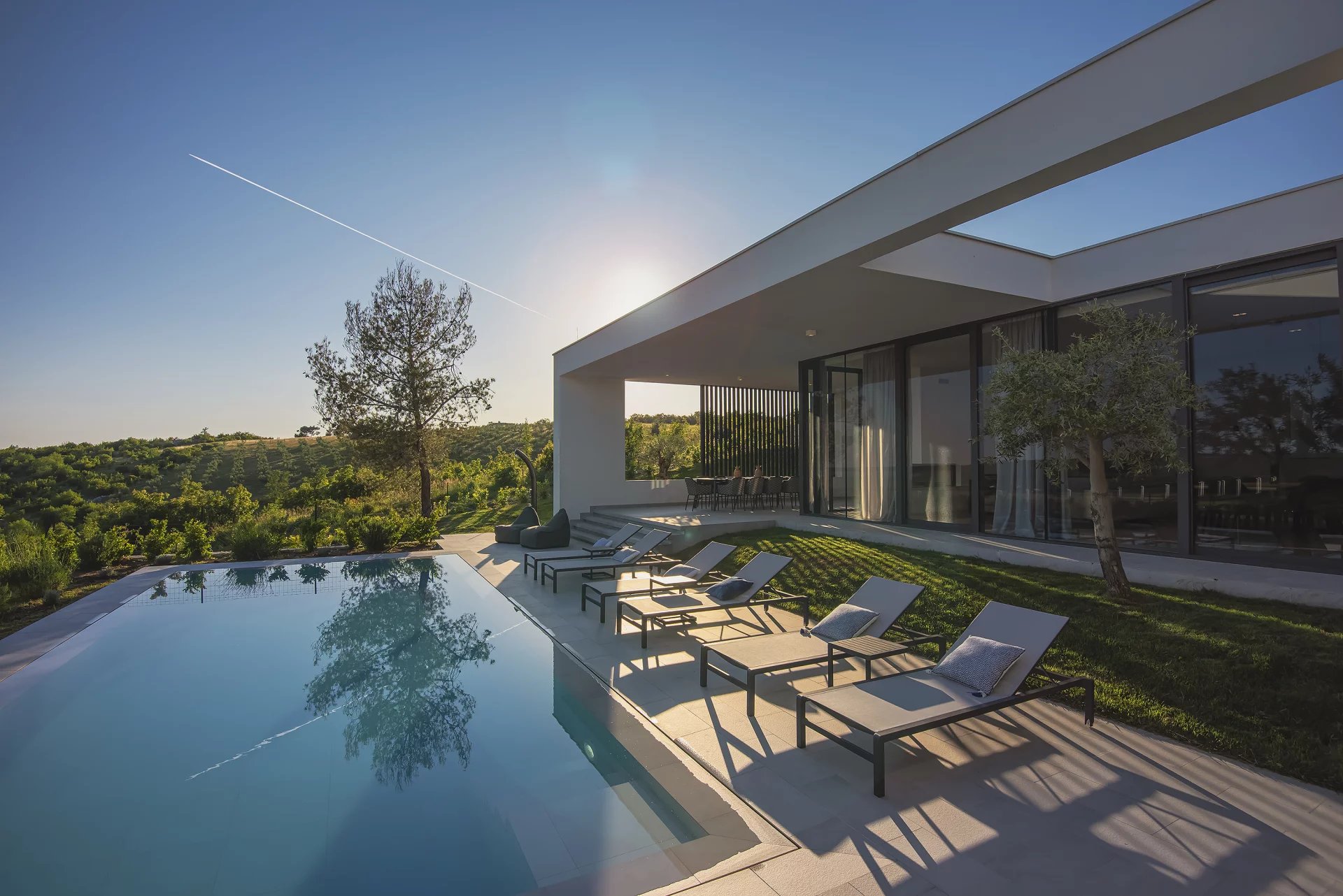 Modern four-bedroom single-story villa with panoramic views and a pool on a 9,000 m² plot
